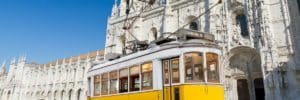 Lisbon electric car in front of Jeronimos