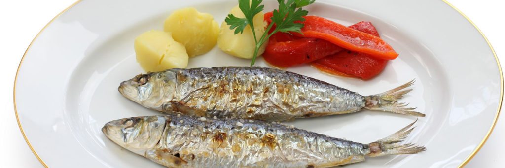 Portuguese charcoal grilled sardines - Portugal culinary | Portugal.com