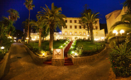 grand hotel villa de france outside night
